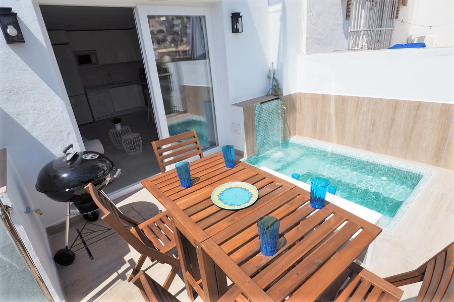 Townhouse with 3 bedrooms, 2 bathrooms, stunning views, private plunge pool and large communal pool near beach and centre of Nerja.