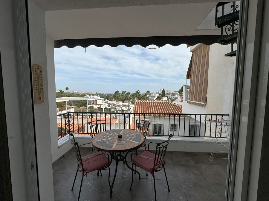 Lovely townhouse that consists of the main part and a separate apartment located in the popular area of Punta Lara in Nerja.