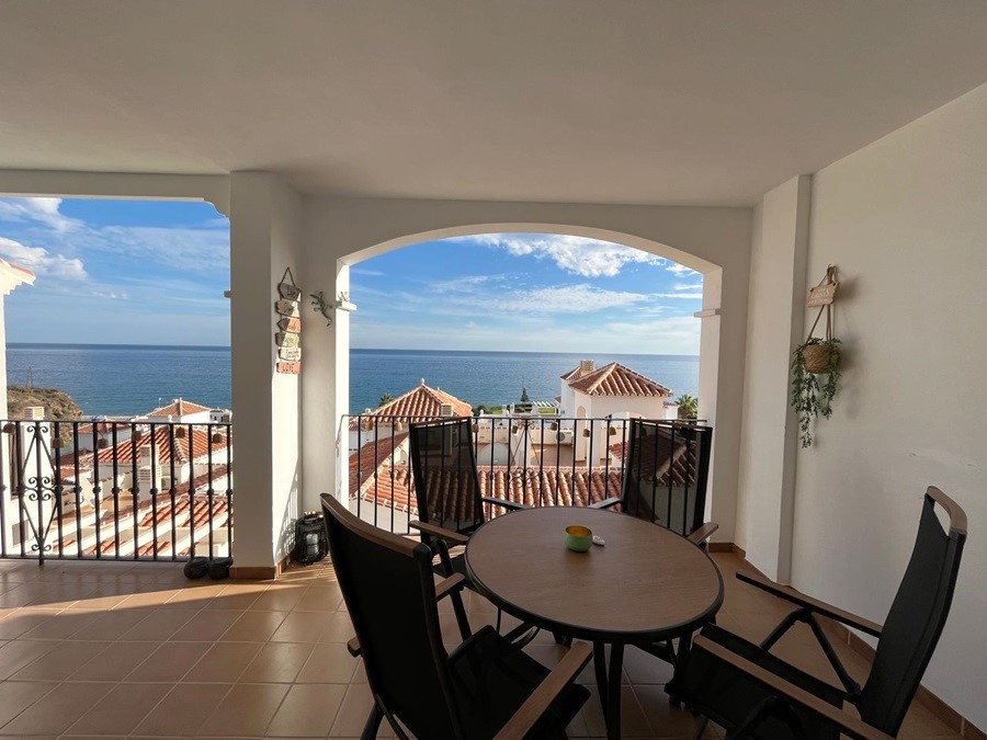 Two apartments located below each other with beautiful sea views, communal pool and garage space in El Peñoncillo, Torrox